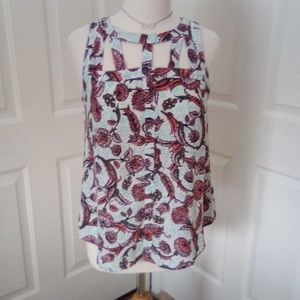 Dressy sleeveless blouse.